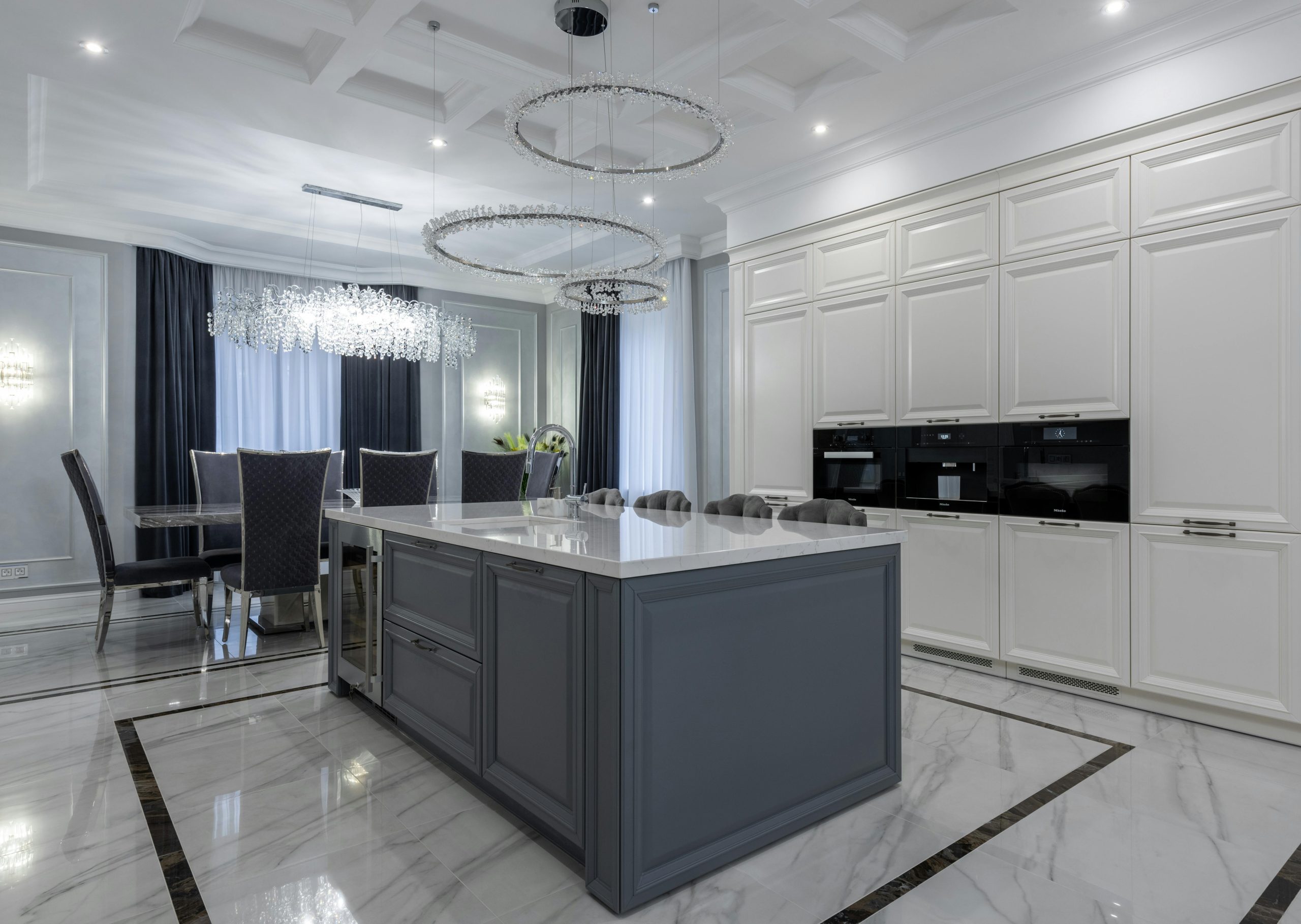 A clean and modern kitchen with natural lighting and decluttered countertops.