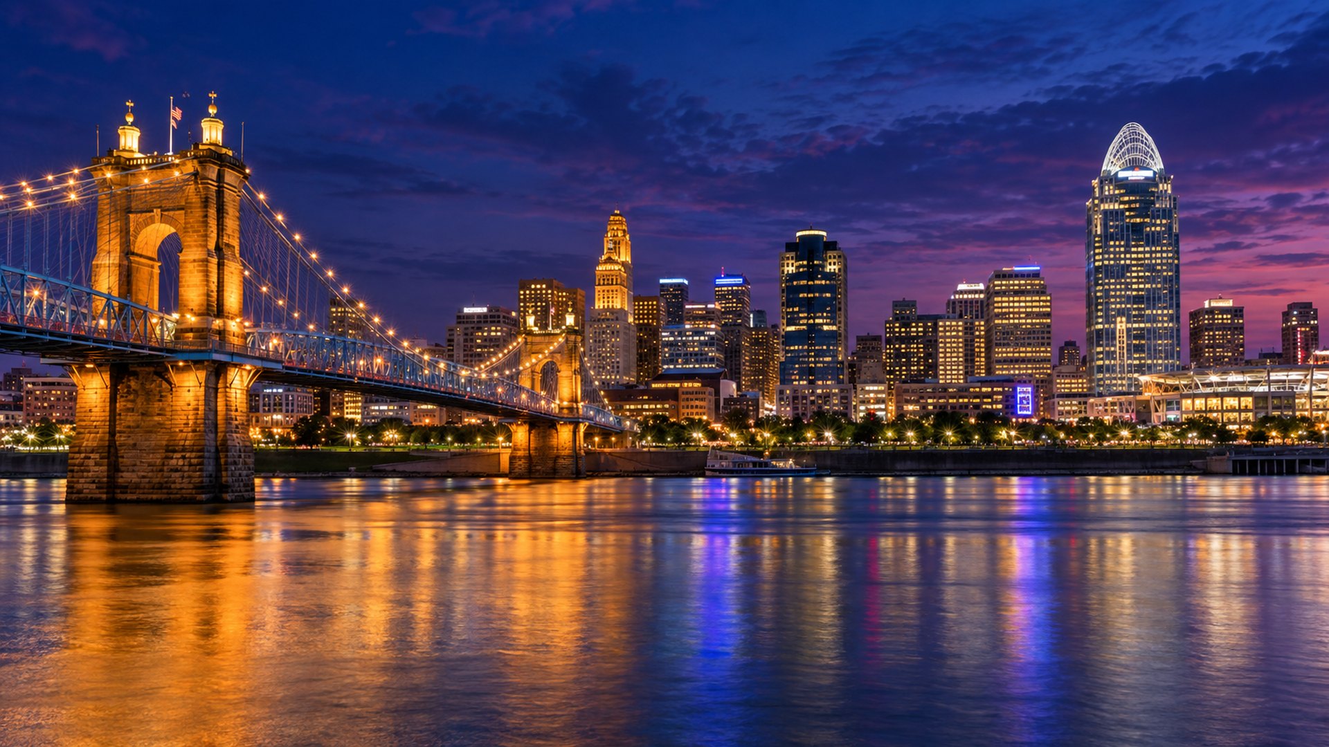 Cincinnati skyline and the Roebling Suspension Bridge over the Ohio River at blue hour, Greater Cincinnati real estate market September 2026 Month in Review, Kristine Green Realtor